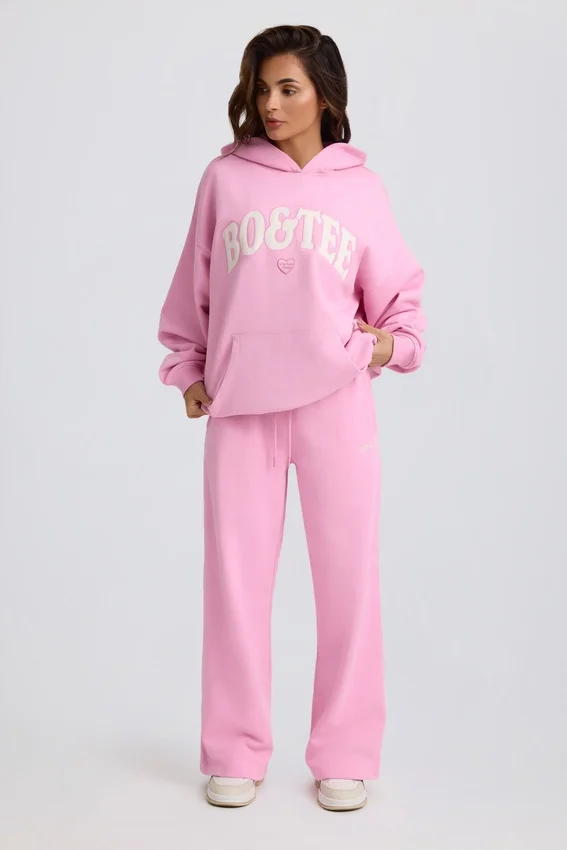 Pantaloni da jogging a vita media e gamba larga in morbido jersey di cotone, colore rosa confetto Pantaloni da jogging a vita media e gamba larga in morbido jersey di cotone, colore rosa confetto