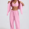 Pantaloni da jogging a vita media e gamba larga in morbido jersey di cotone, colore rosa confetto Pantaloni da jogging a vita media e gamba larga in morbido jersey di cotone, colore rosa confetto