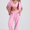 Pantaloni da jogging a vita media e gamba larga in morbido jersey di cotone, colore rosa confetto Pantaloni da jogging a vita media e gamba larga in morbido jersey di cotone, colore rosa confetto