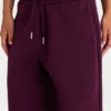 Pantaloni da jogging in jersey di cotone spazzolato a vita media in bordeaux Pantaloni da jogging in jersey di cotone spazzolato a vita media in bordeaux