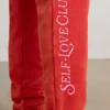 Pantaloni da jogging oversize in jersey spazzolato, colore rosso Pantaloni da jogging oversize in jersey spazzolato, colore rosso