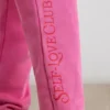 Pantaloni da jogging oversize in jersey spazzolato rosa shocking