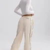 Pantaloni da tuta a gamba larga idrorepellenti in marmo Pantaloni da tuta a gamba larga idrorepellenti in marmo