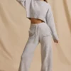 Pantaloni jogger a vita media e gamba larga in maglia a coste color ghiaccio melange Pantaloni jogger a vita media e gamba larga in maglia a coste color ghiaccio melange