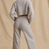 Pantaloni jogger a vita media e gamba larga in maglia a coste color ghiaccio melange Pantaloni jogger a vita media e gamba larga in maglia a coste color ghiaccio melange