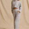 Pantaloni jogger a vita media e gamba larga in maglia a coste color ghiaccio melange Pantaloni jogger a vita media e gamba larga in maglia a coste color ghiaccio melange