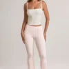 Pantaloni svasati a vita media con risvolto in modal Bebe con stampa a righe Pantaloni svasati a vita media con risvolto in modal Bebe con stampa a righe