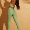 Pantaloni Zuni con allacciatura sul retro in verde Pantaloni Zuni con allacciatura sul retro in verde