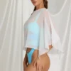 Poncho trasparente Zarayah in bianco