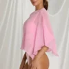 Poncho trasparente Zarayah in rosa zucchero filato