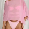 Poncho trasparente Zarayah in rosa zucchero filato