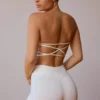 Reggiseno a fascia con incrocio sulla schiena in bianco tenue Reggiseno a fascia con incrocio sulla schiena in bianco tenue
