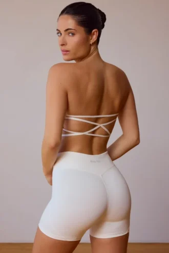 Reggiseno a fascia con incrocio sulla schiena in bianco tenue