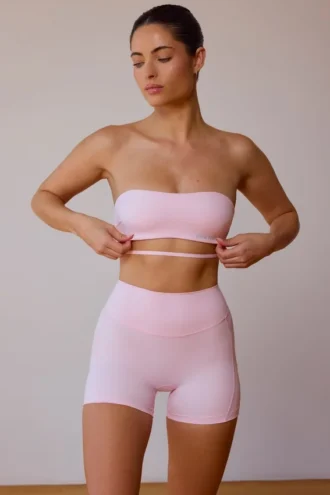 Reggiseno a fascia con spalline incrociate sulla schiena in rosa tenue