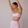 Reggiseno a fascia con spalline incrociate sulla schiena in rosa tenue Reggiseno a fascia con spalline incrociate sulla schiena in rosa tenue