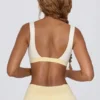 Reggiseno sportivo a contrasto in Lemon Marl Reggiseno sportivo a contrasto in Lemon Marl