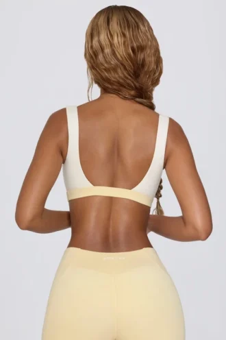 Reggiseno sportivo a contrasto in Lemon Marl