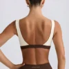 Reggiseno sportivo a contrasto in melange color noce Reggiseno sportivo a contrasto in melange color noce
