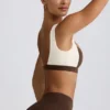 Reggiseno sportivo a contrasto in melange color noce Reggiseno sportivo a contrasto in melange color noce