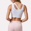 Reggiseno sportivo asimmetrico senza cuciture in morbida maglia a costine, bianco Reggiseno sportivo asimmetrico senza cuciture in morbida maglia a costine, bianco