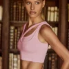 Reggiseno sportivo asimmetrico senza cuciture in morbida maglia a costine, colore rosa cipria Reggiseno sportivo asimmetrico senza cuciture in morbida maglia a costine, colore rosa cipria