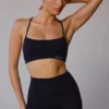 Reggiseno sportivo con incrocio sulla schiena in nero Reggiseno sportivo con incrocio sulla schiena in nero