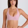 Reggiseno sportivo con scollo a V e incrocio sulla schiena in color malva Reggiseno sportivo con scollo a V e incrocio sulla schiena in color malva