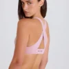 Reggiseno sportivo con scollo a V e incrocio sulla schiena in color malva Reggiseno sportivo con scollo a V e incrocio sulla schiena in color malva