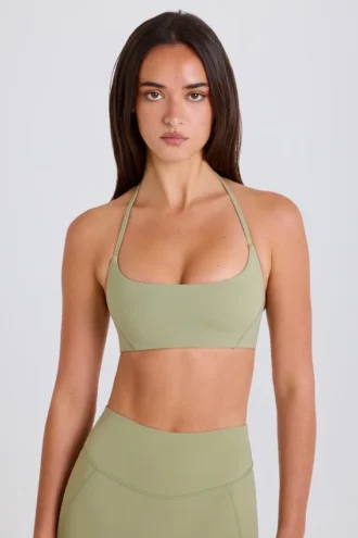 Reggiseno sportivo con scollo rotondo e collo all’americana in Matcha