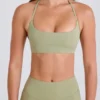 Reggiseno sportivo con scollo rotondo e collo all’americana in Matcha Reggiseno sportivo con scollo rotondo e collo all’americana in Matcha