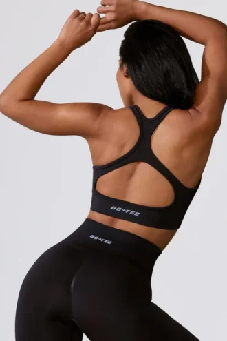 Reggiseno sportivo Define Luxe con cut-out in nero Reggiseno sportivo Define Luxe con cut-out in nero
