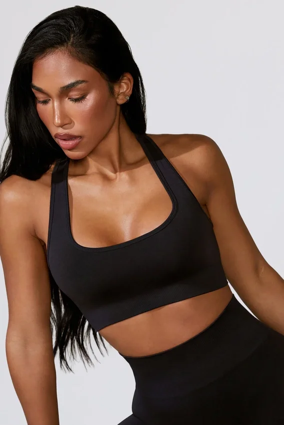Reggiseno sportivo Define Luxe con cut-out in nero Reggiseno sportivo Define Luxe con cut-out in nero