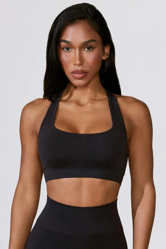 Reggiseno sportivo Define Luxe con cut-out in nero Reggiseno sportivo Define Luxe con cut-out in nero