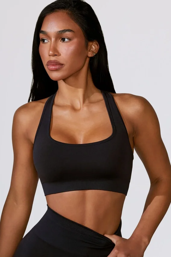 Reggiseno sportivo Define Luxe con cut-out in nero Reggiseno sportivo Define Luxe con cut-out in nero