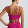 Reggiseno sportivo Define Luxe con scollo a V in Berry Reggiseno sportivo Define Luxe con scollo a V in Berry