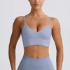 Reggiseno sportivo Define Luxe con scollo a V in grigio blu Reggiseno sportivo Define Luxe con scollo a V in grigio blu