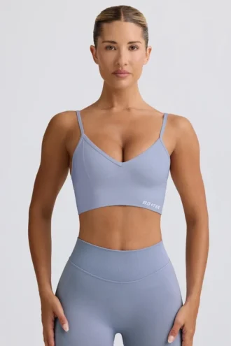 Reggiseno sportivo Define Luxe con scollo a V in grigio blu