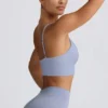 Reggiseno sportivo Define Luxe con scollo a V in grigio blu Reggiseno sportivo Define Luxe con scollo a V in grigio blu