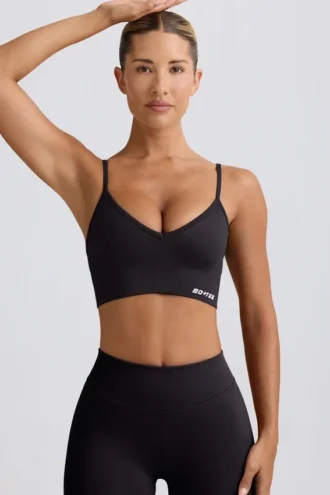 Reggiseno sportivo Define Luxe con scollo a V in nero