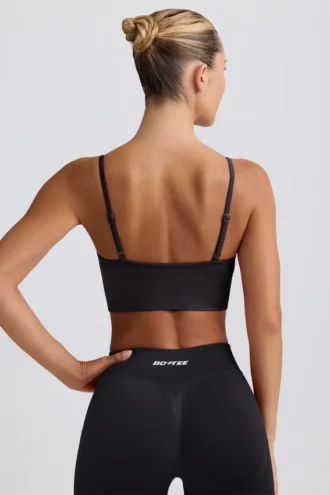 Reggiseno sportivo Define Luxe con scollo a V in nero