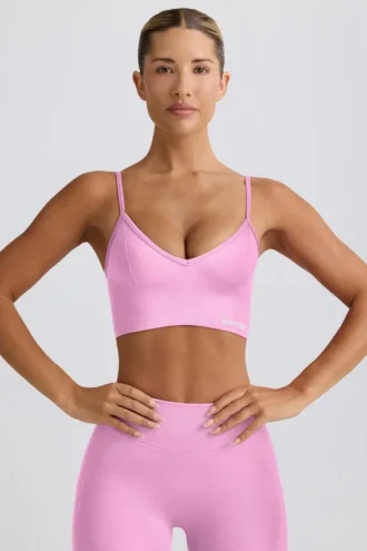 Reggiseno sportivo Define Luxe con scollo a V in rosa bubblegum