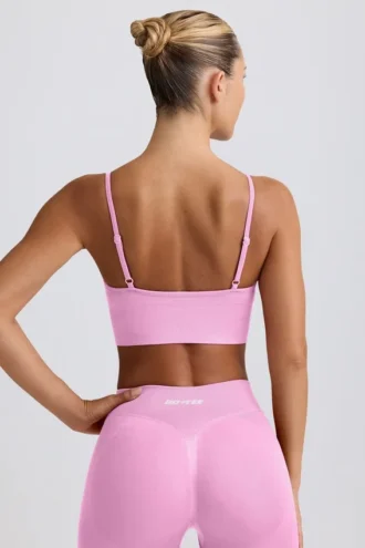 Reggiseno sportivo Define Luxe con scollo a V in rosa bubblegum
