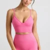 Reggiseno sportivo Define Luxe con scollo a V in rosa shocking Reggiseno sportivo Define Luxe con scollo a V in rosa shocking
