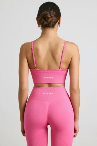 Reggiseno sportivo Define Luxe con scollo a V in rosa shocking