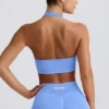 Reggiseno sportivo Define Luxe con scollo all’americana in azzurro Reggiseno sportivo Define Luxe con scollo all’americana in azzurro