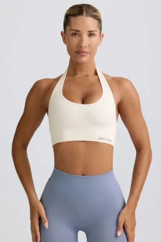 Reggiseno sportivo Define Luxe con scollo all’americana in bianco