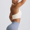 Reggiseno sportivo Define Luxe con scollo all’americana in bianco Reggiseno sportivo Define Luxe con scollo all’americana in bianco