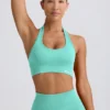 Reggiseno sportivo Define Luxe con scollo all’americana in menta Reggiseno sportivo Define Luxe con scollo all’americana in menta