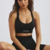 Reggiseno sportivo Define Luxe con scollo profondo in nero Reggiseno sportivo Define Luxe con scollo profondo in nero