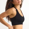 Reggiseno sportivo FlexiRib con dorso a vogatore in nero Reggiseno sportivo FlexiRib con dorso a vogatore in nero